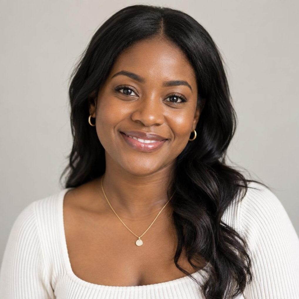 Portrait of a woman with dark hair smiling